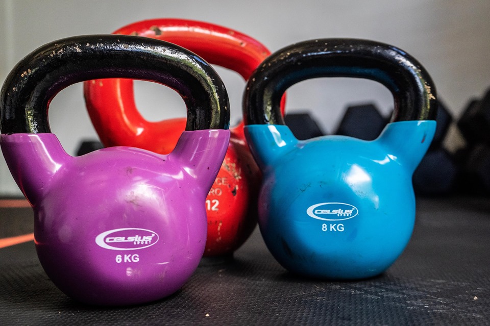 Colourful kettlebells in the studio